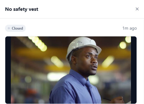 Violation detail showing the captured evidence snapshot of a worker without a safety vest